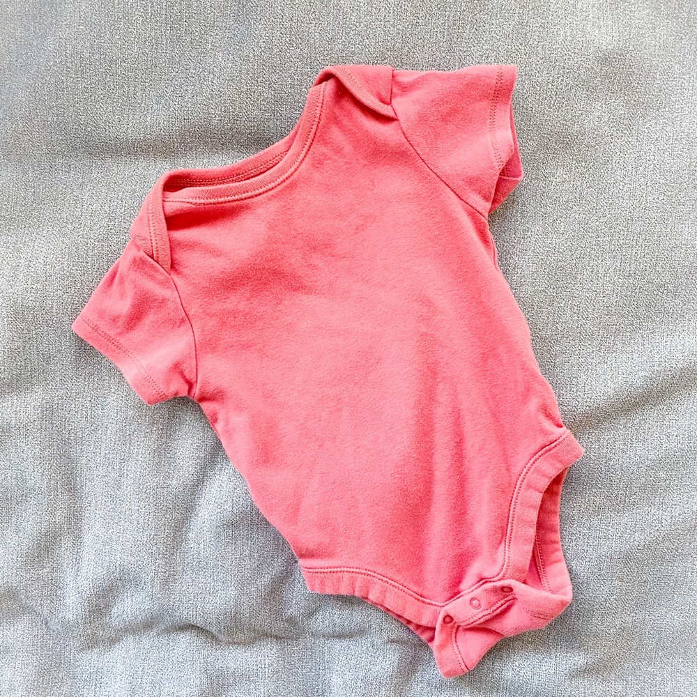 Pink bodysuit onesie